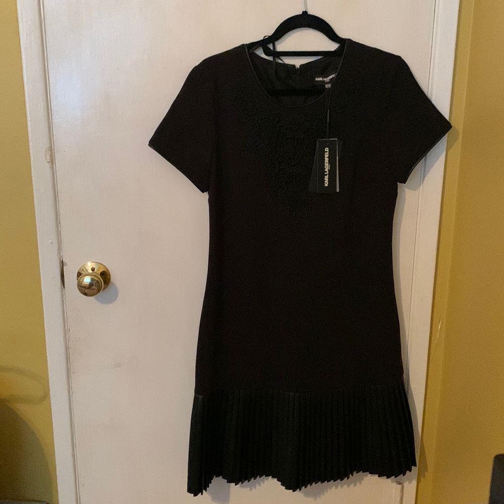 Black dress with leather pleated
